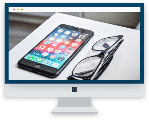 Iphone next to glasses