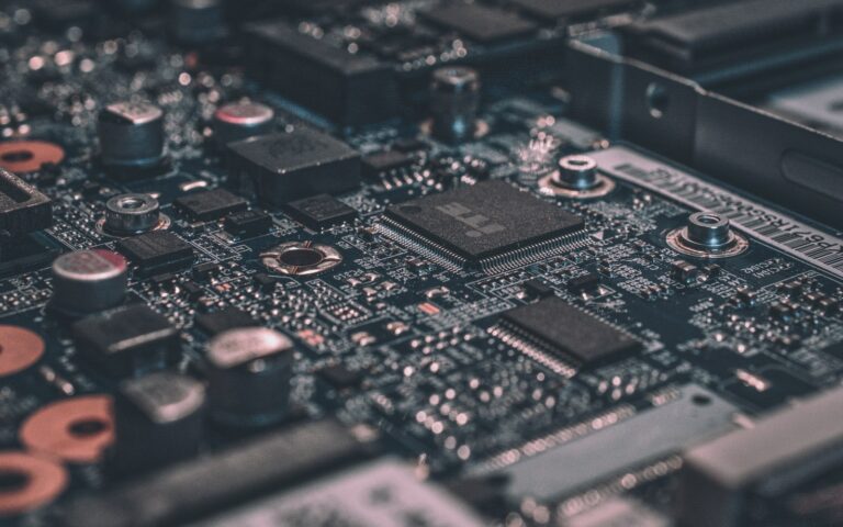 Close-up of a circuit board, representing the technical infrastructure signals that determine AI crawler access
