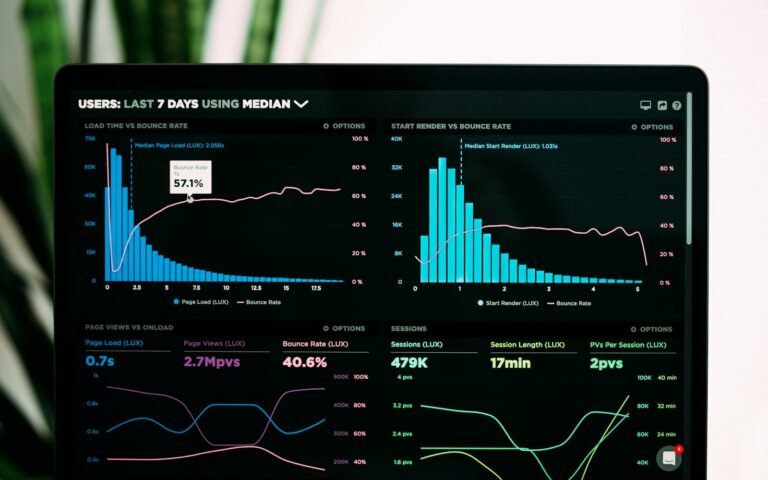 Analytics dashboard on a laptop screen, representing data-driven comparison of AI SEO and GEO agencies for SaaS